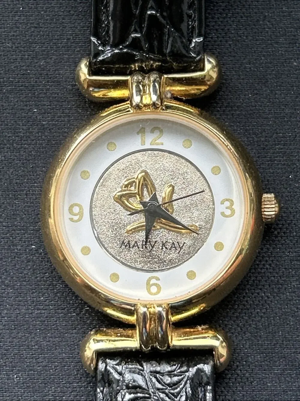 Mary Kay Gold Tone Black Band Women’s Quartz Watch